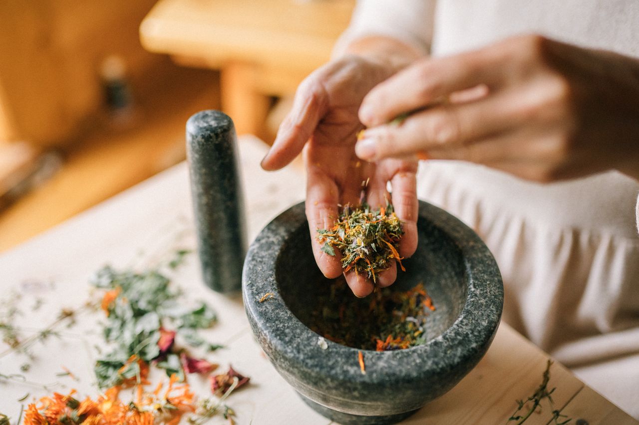 Herbalist preparing natural remedies